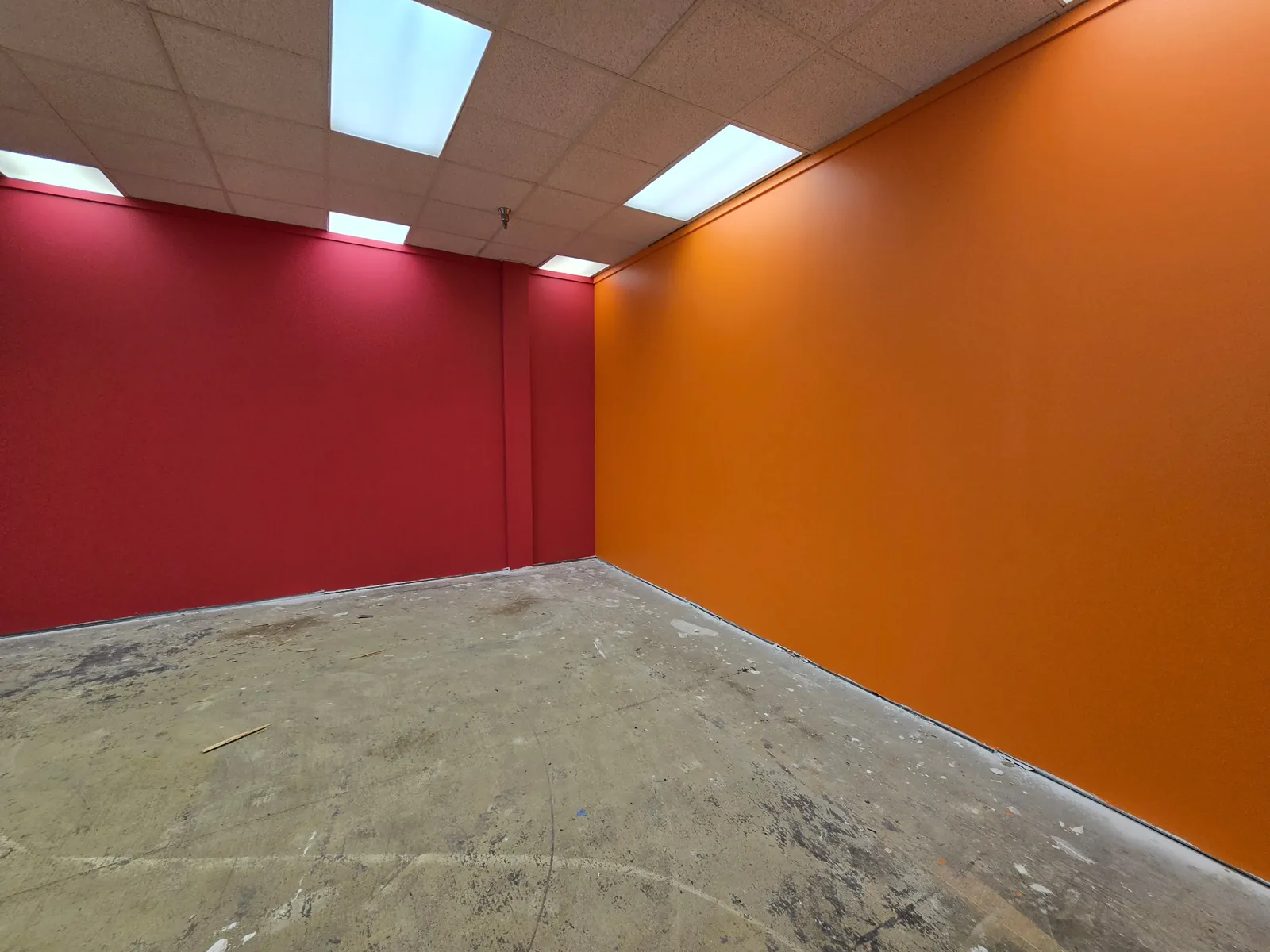 Commercial Interior - Bold Red and Orange Accent Walls · Minneapolis, MN · Bold accent walls, creative workspace Commercial Interior Bold Accent Walls in Minneapolis, MN